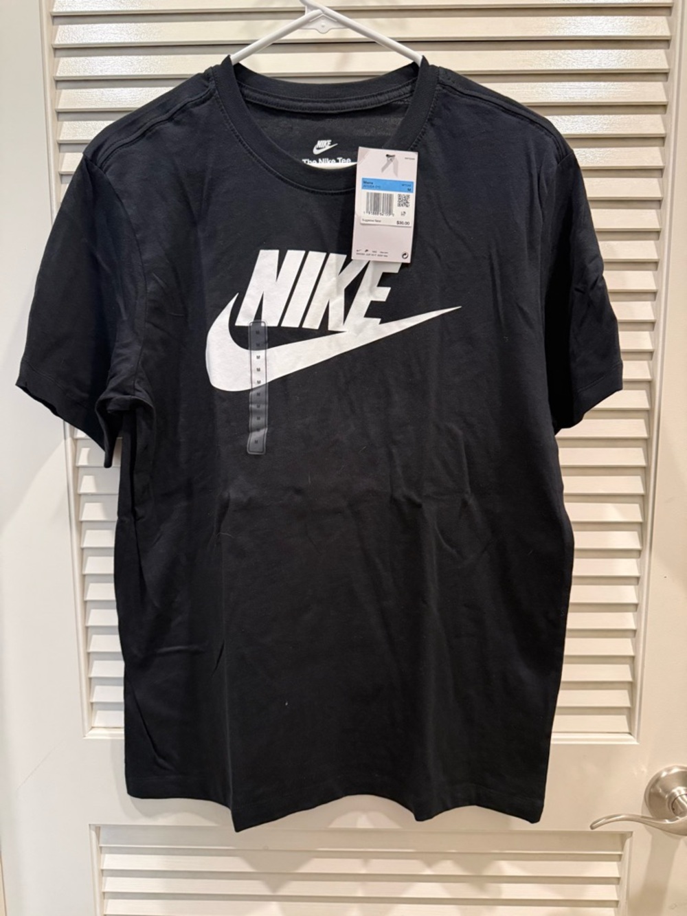 Nike Men’s Black Tee with White Swoosh Logo